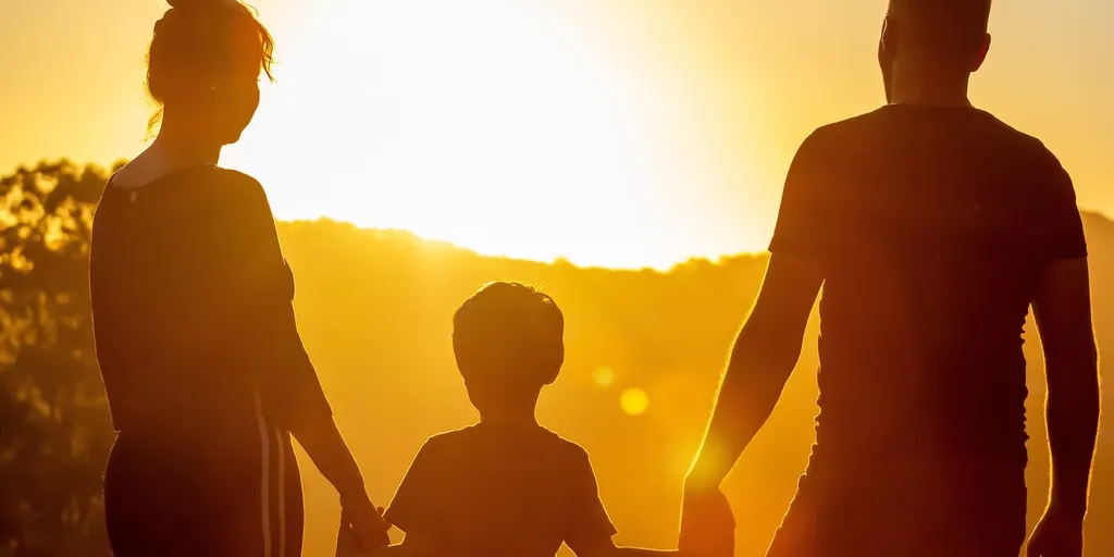 Familie und Sonnenuntergang